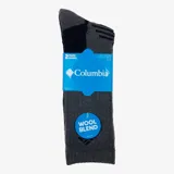 Pack de dos pares de medias Columbia de caña media, confeccionadas en mezcla de lana, con diseño en color gris y detalles en negro. Presentan amortiguación total, soporte para el arco del pie, pierna acanalada y refuerzo en talón y puntera.