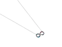 Collar de acero plateado con dije en forma de infinito con incrustaciones de circonitas de colores rosa, celeste y azul.