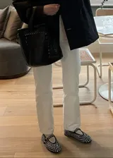 Balerinas negras con apliques de strass.