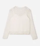 Blusa de encaje floral texturizado con forro interno, manga larga y cuello redondo. Presenta un diseño ajustado y corto, confeccionada en poliamida con un toque de elastano.