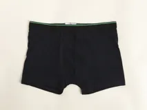 Boxer blanco de algodón con cintura elástica con el logo de la marca.