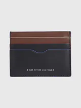 Tarjetero Tommy Hilfiger de cuero vacuno negro, marrón y bordó, con múltiples ranuras para tarjetas y logo estampado.