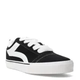 Championes urbanos de estilo skate, color negro con detalles en blanco, confeccionados en lona con suela de goma vulcanizada y cordones gruesos.