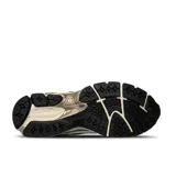 Championes New Balance modelo U1906NA, color gris con detalles en blanco y negro.