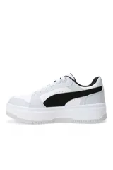 Championes Puma modelo Rebound Femme Low, color blanco, con diseño de plataforma y detalles perforados en la puntera y los laterales.