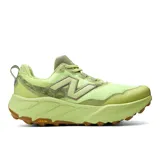 Championes de trail running New Balance modelo Hierro v9, color verde lima con suela de caucho color marrón. Presentan tecnología Fresh Foam X en la entresuela y suela Vibram para mayor tracción.