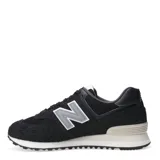 Championes urbanos New Balance modelo 574, color negro con detalles en gris y blanco, confeccionados en gamuza y malla, con logo "N" característico en los laterales y entresuela ENCAP.