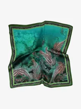 Pañuelo cuadrado de seda con estampado de girasoles en un jarrón. Tiene un borde amarillo con un patrón decorativo.