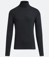 Buzo de corte slim con cuello alto y mangas largas, confeccionado en tejido de punto liso.