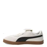 Championes urbanos Puma Club Azura Sd, color beige con detalles en negro y suela de goma color caramelo. Presentan un diseño clásico con la icónica franja lateral de la marca y lengüeta con logo.