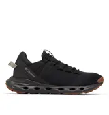 Championes Columbia modelo Terrastride, color negro con suela de goma marrón. Presentan estructura transpirable con orificios de ventilación en la entresuela, cordones para ajuste seguro y tecnología Omni-Grip para mayor tracción.