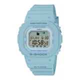 Reloj digital Casio G-Shock G-LIDE, modelo cuadrado, color celeste claro. Caja y correa de resina con protección 'Protection' y resistencia al agua 20 BAR. Pantalla digital que muestra día de la semana, fecha y hora.