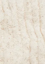 Pantalón de punto con diseño de canalé, corte acampanado y cintura elástica.