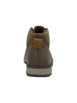 Botín de cuero color verde de caña baja con cordones, suela dentada antideslizante con tecnología honey foam y detalles metálicos en los ojalillos.