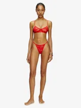 Colaless negra de encaje jacquard elástico con motivo camuflado y logo Oval D aplicado en el frente.