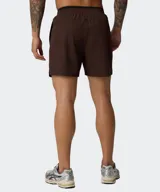 Short de entrenamiento Fabletics modelo The Fundamental, color gris, de corte clásico y tejido ligero de alto rendimiento con cintura elástica.