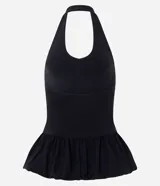 Blusa de frente única en color blanco, con diseño de cuello halter y ruedo con volado estilo peplum que aporta volumen. Confeccionada en algodón con un toque de elastano para mayor comodidad.