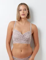 Bralette de encaje floral color beige, con breteles regulables y cierre trasero de tres posiciones.