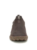Zapato tipo slip-on Caterpillar modelo Hex Ready, confeccionado en cuero nubuck color marrón. Presenta diseño sin cordones con elásticos laterales, entresuela de EVA en tono beige y suela de goma con relieve para mayor tracción.