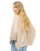 Cardigan de tejido suave con frente abierto y mangas amplias de corte holgado.