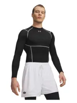 Remera térmica de compresión Under Armour, manga larga, color negro con costuras reforzadas en color gris. Presenta cuello redondo y logo de la marca en el pecho.