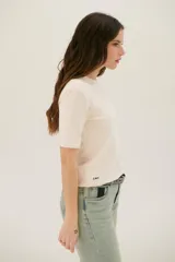 Remera manga 3/4 color celeste.