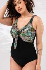 Malla entera negra con estampado de hojas y animal print en la parte superior, con nudo en el escote y breteles anchos.