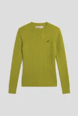 Sweater tejido con diseño de ochos color verde lima, cuello redondo y manga larga, con pequeño bordado oscuro en el pecho.