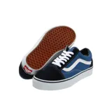 Championes Vans Old Skool de caña baja, capellada de lona y gamuza azul, con la icónica sidestripe de cuero blanca, cuello acolchado, plantilla acolchada y la suela de waffle original de Vans.