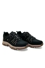 Calzado deportivo Santa Barbara modelo Torrence, color gris oscuro con suela y detalles en tostado, diseñado para trekking y actividades al aire libre.
