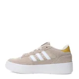 Championes urbanos Adidas modelo Break Start Bold, color beige con detalles en blanco y dorado. Presentan diseño de plataforma, con las icónicas tres tiras laterales en blanco y un accesorio de cadena dorada decorativa en el lateral.