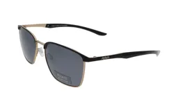 Lentes de sol Floats con marco dorado y negro, lentes grises polarizados y patillas negras con logo de la marca.