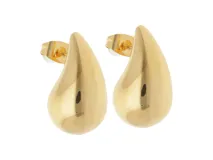 Aros colgantes de acero dorado con forma de gota.