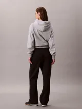 Pantalón deportivo de felpa francesa Calvin Klein, color negro, de corte recto con cintura elástica.