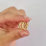 Aros tipo argolla pequeños de plata 925 con circonitas engarzadas.