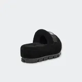 Sandalias UGG Fluffita Clear color negro, con plataforma plana y suela translúcida. Tienen una correa ajustable y plantilla contorneada. Forradas con mezcla de lana UGGplush™ y logo gráfico.