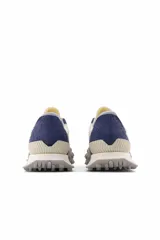 Championes New Balance XC-72, color azul, beige y gris.