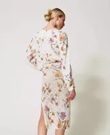 Falda midi de punto calado con estampa floral, corte entallado y elástico en la cintura.