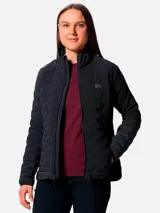 Campera técnica de plumón para mujer, color gris oscuro, con diseño de compartimentos elásticos integrados. Cuenta con cierre frontal completo, cuello alto, bolsillos laterales con cierre y puños con ribete elástico. Es una prenda compresible diseñada para actividades de montaña y senderismo.