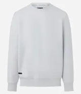 Buzo deportivo blanco de manga larga, cuello redondo y etiqueta negra aplicada en la manga izquierda. Confeccionado en tejido de poliéster, viscosa y elastano, de secado ultrarrápido, ligero y cómodo.