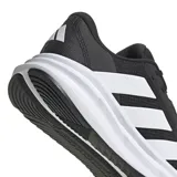 Championes de running Adidas modelo Galaxy 7 M, color negro con detalles en blanco. Presentan empeine de tejido textil resistente, mediasuela con tecnología Cloudfoam para mayor amortiguación y suela de goma para un agarre óptimo.
