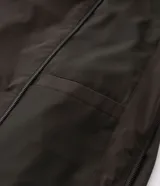 Campera bomber Marfinno para hombre, de color negro, confeccionada en poliamida con elastano y forro de poliéster. Cuenta con cuello alto, cierre frontal por cremallera y elástico en puños y cintura.