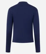 Blusa tipo polo de manga larga confeccionada en algodón, con cuello clásico y cierre frontal de botones. Presenta un diseño de corte regular y acabado suave.