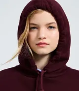 Buzo con capucha y cordones ajustables, de corte holgado y manga larga. Presenta un diseño estampado en el frente con la frase 'New York' y una estrella con efecto desgastado.