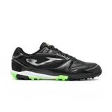 Championes de fútbol 5 Joma Dribling 2601 Black, de color negro con detalles en plateado y verde. Cuenta con upper de piel sintética y paneles de mesh transpirable, refuerzo en la puntera y suela multitaco de caucho con entresuela blanca.