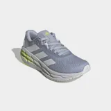 Championes de running Adidas Adistar 3, color gris claro con tres franjas blancas en los laterales. Presentan una mediasuela gruesa blanca con detalles en verde lima fluorescente en la parte trasera, donde se lee "REPETITOR".