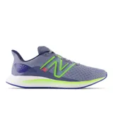 Championes New Balance Lowky para hombre, color lila con detalles en verde neón y azul.