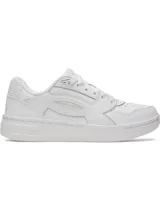 Championes Under Armour modelo W Flex, de diseño urbano en color blanco total. Presentan una parte superior de cuero premium con detalles superpuestos, panel acanalado en el talón y suela de goma resistente con entresuela de EVA para mayor amortiguación.