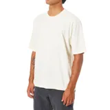 Remera de algodón de corte oversize y calce relajado, con cuello redondo y mangas cortas, inspirada en la estética de los años 90.