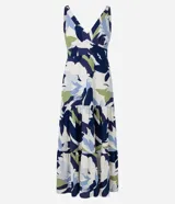 Vestido midi de viscolino con escote en V, breteles anchos y falda con recortes y fruncidos. Presenta un estampado de follaje en tonos azul, celeste y verde sobre base clara.